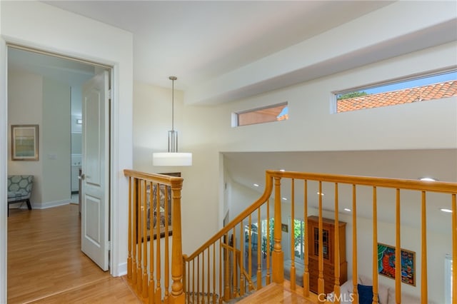 15535 Mallory Ct, Moorpark, CA 93021 - stairs featuring wood finished floors and baseboards
