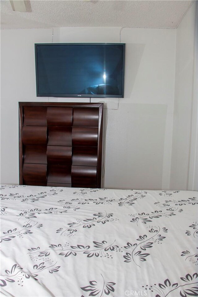 4727 W 147th St Unit 251, Lawndale, CA 90260 - bedroom featuring a textured ceiling