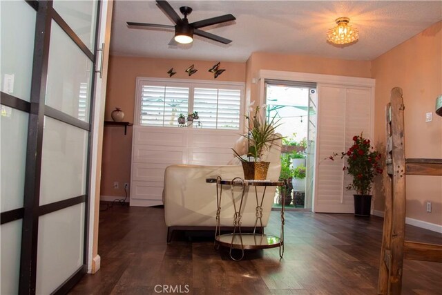 4727 W 147th St Unit 251, Lawndale, CA 90260 - foyer featuring dark wood-style floors, healthy amount of natural light, and a ceiling fan
