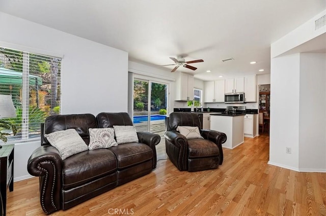 44938 Tehachapi, Temecula, CA 92592 - living area featuring a ceiling fan, light wood-type flooring, and recessed lighting