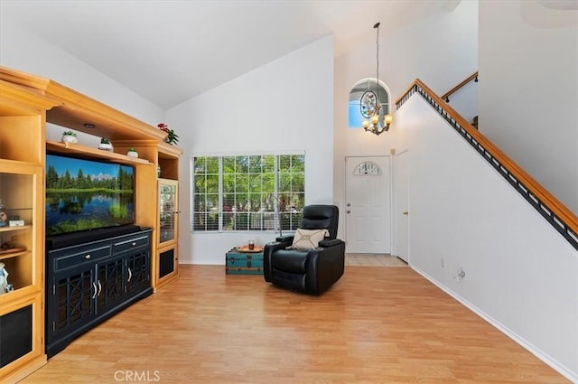 44938 Tehachapi, Temecula, CA 92592 - sitting room with high vaulted ceiling, light wood-type flooring, and a chandelier