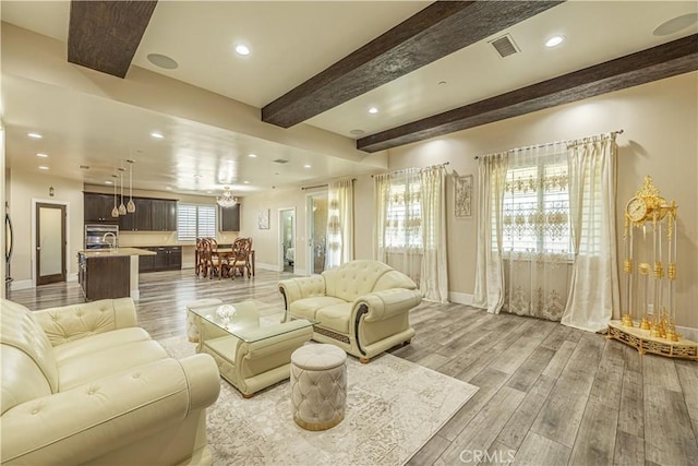 4664 Quartz Hill Rd, Quartz Hill, CA 93536 - living room featuring light wood-style flooring, beamed ceiling, and recessed lighting