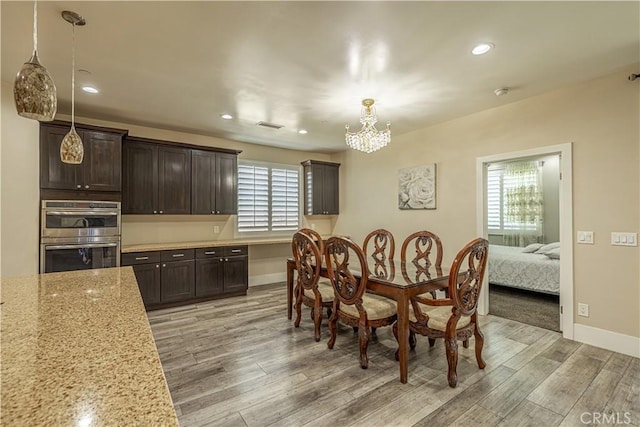 4664 Quartz Hill Rd, Quartz Hill, CA 93536 - dining area featuring a chandelier, light wood finished floors, and recessed lighting