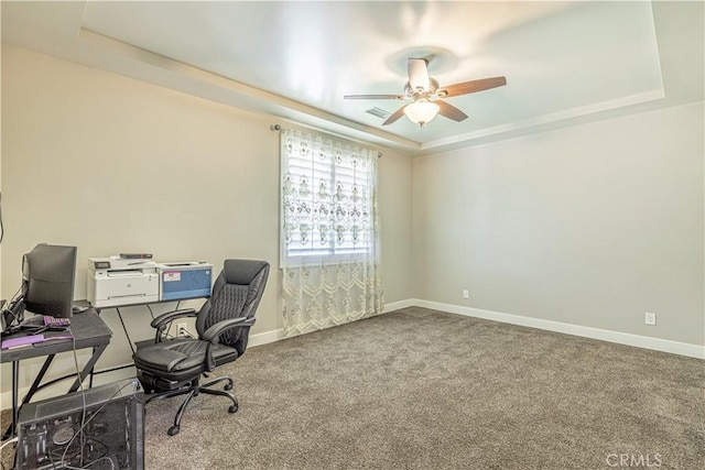 4664 Quartz Hill Rd, Quartz Hill, CA 93536 - office area featuring a tray ceiling, ceiling fan, and carpet flooring