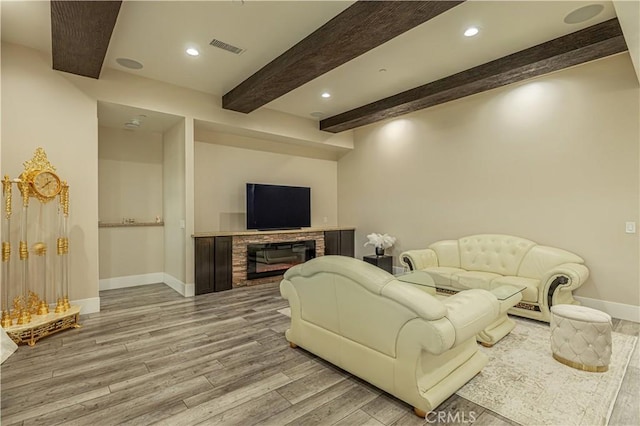 4664 Quartz Hill Rd, Quartz Hill, CA 93536 - living area featuring wood finished floors, beam ceiling, and recessed lighting
