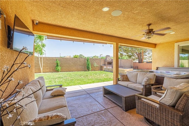 4664 Quartz Hill Rd, Quartz Hill, CA 93536 - fenced backyard with a patio area, outdoor lounge area, ceiling fan, and a hot tub