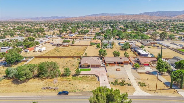 4664 Quartz Hill Rd, Quartz Hill, CA 93536 - aerial view of residential area featuring a mountainous background