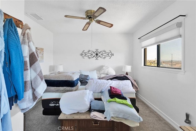 15761 Joshua Rd, Apple Valley, CA 92307 - carpeted bedroom featuring a textured ceiling and a ceiling fan
