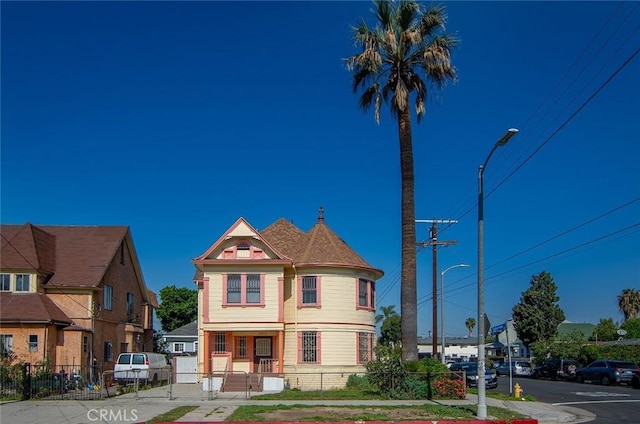 1703 Toberman St, Los Angeles, CA 90015 - victorian house featuring a gate and covered porch