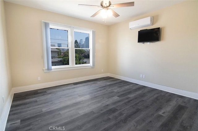 1703 Toberman St, Los Angeles, CA 90015 - spare room with a wall mounted AC, dark wood-style flooring, and a ceiling fan