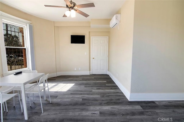 1703 Toberman St, Los Angeles, CA 90015 - unfurnished dining area featuring a wall mounted AC, dark wood finished floors, and a ceiling fan