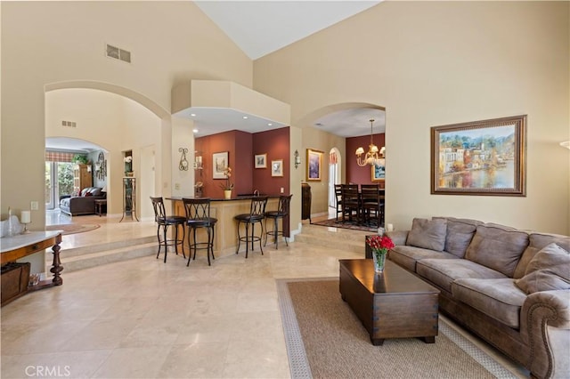 71 Via Barcaza, Coto De Caza, CA 92679 - living area with arched walkways, high vaulted ceiling, and a chandelier