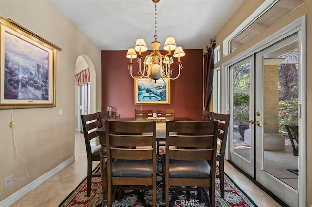 71 Via Barcaza, Coto De Caza, CA 92679 - dining space featuring a chandelier, french doors, and light tile patterned floors