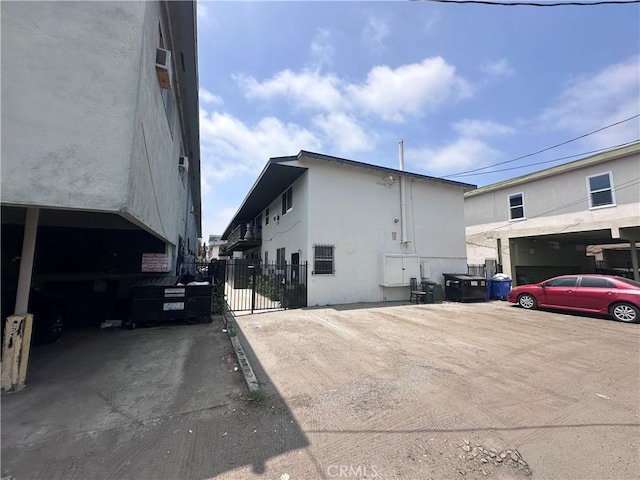1942 S Sherbourne Dr, Los Angeles, CA 90034 - view of side of property featuring stucco siding