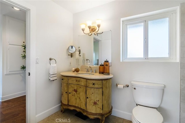 8042 Driftwood Dr, Huntington Beach, CA 92646 - bathroom with vanity and a chandelier