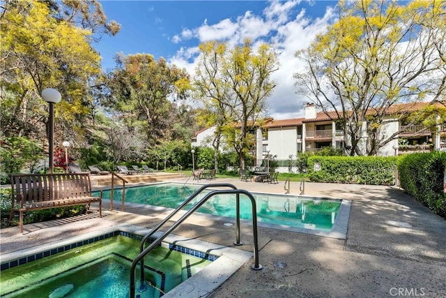 4210 Via Arbolada Unit 317, Los Angeles, CA 90042 - community pool with a community hot tub and a patio area