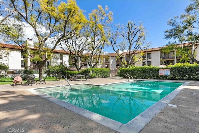 4210 Via Arbolada Unit 317, Los Angeles, CA 90042 - community pool with a residential view and a patio