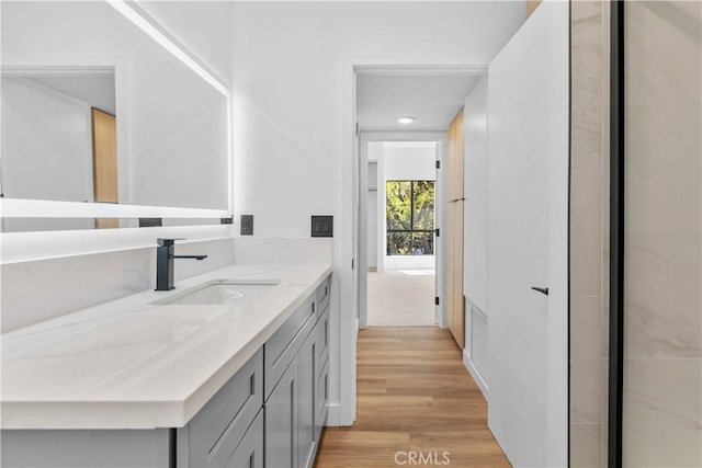 4210 Via Arbolada Unit 317, Los Angeles, CA 90042 - bathroom featuring vanity, wood finished floors, and recessed lighting