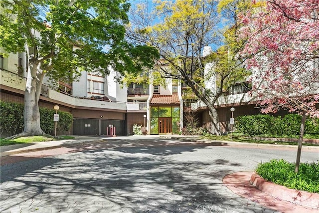 4210 Via Arbolada Unit 317, Los Angeles, CA 90042 - view of building exterior with a garage