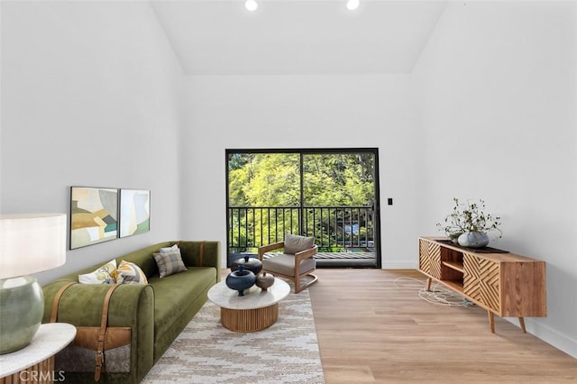 4210 Via Arbolada Unit 317, Los Angeles, CA 90042 - living area with recessed lighting, light wood-style floors, and high vaulted ceiling