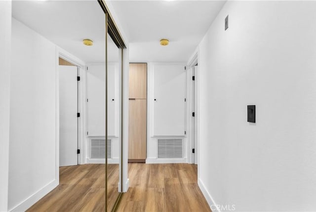 4210 Via Arbolada Unit 317, Los Angeles, CA 90042 - corridor featuring light wood-style flooring and baseboards