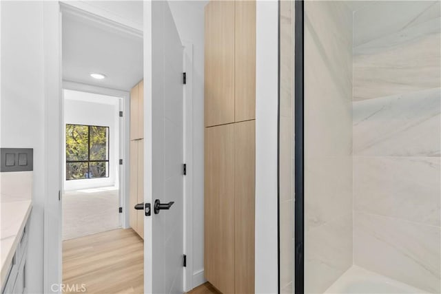 4210 Via Arbolada Unit 317, Los Angeles, CA 90042 - full bath with vanity, wood finished floors, and shower / tub combination