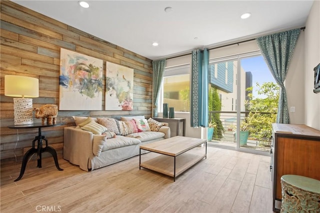 1019 Sequoia Pl, Montebello, CA 90640 - living area featuring wooden walls, wood finished floors, and recessed lighting