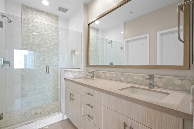 1019 Sequoia Pl, Montebello, CA 90640 - bathroom with a stall shower, double vanity, tile patterned flooring, and recessed lighting