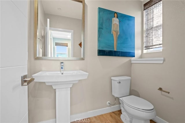 1019 Sequoia Pl, Montebello, CA 90640 - bathroom featuring healthy amount of natural light and wood finished floors