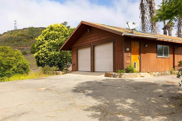 29556 Sierra Rojo Ln, Valley Center, CA 92082 - view of front of home with a detached garage