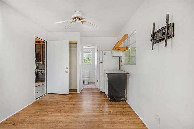 29556 Sierra Rojo Ln, Valley Center, CA 92082 - unfurnished living room with a ceiling fan and light wood-type flooring