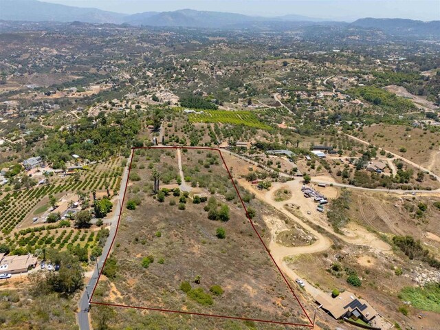 29556 Sierra Rojo Ln, Valley Center, CA 92082 - overview of rural landscape featuring property boundaries highlighted and a mountain backdrop