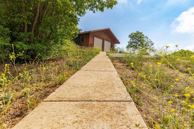 29556 Sierra Rojo Ln, Valley Center, CA 92082 - surrounding community with a detached garage and an outbuilding