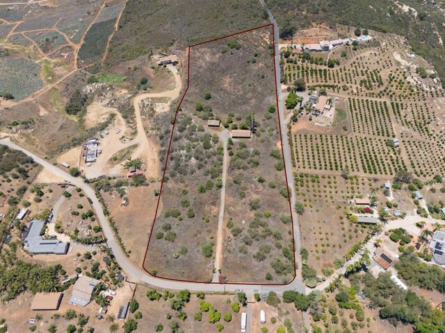 29556 Sierra Rojo Ln, Valley Center, CA 92082 - aerial view of sparsely populated area with property parcel outlined