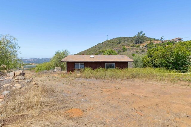 29556 Sierra Rojo Ln, Valley Center, CA 92082 - view of side of home featuring a mountain view