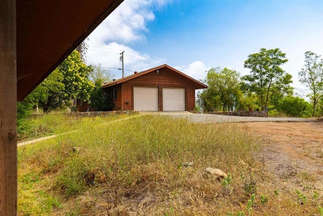 29556 Sierra Rojo Ln, Valley Center, CA 92082 - view of home's exterior featuring a detached garage