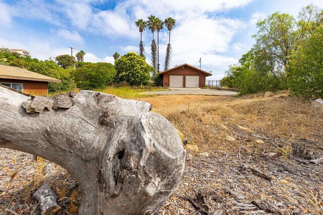 29556 Sierra Rojo Ln, Valley Center, CA 92082 - view of yard with a garage and an outbuilding