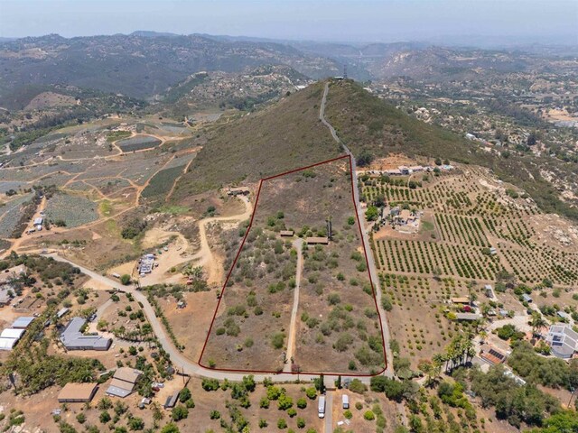 29556 Sierra Rojo Ln, Valley Center, CA 92082 - view of rural area with property boundaries highlighted and a mountain backdrop