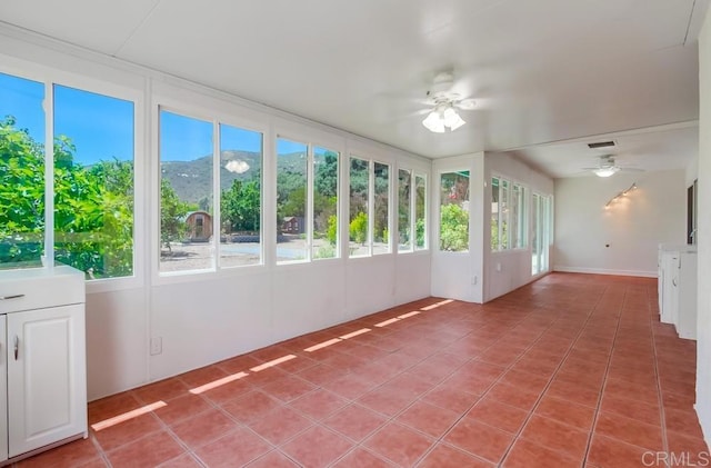 12919 Evalyn Pl, Poway, CA 92064 - unfurnished sunroom with a mountain view and tile patterned floors