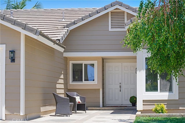 4004 Polk Ct, Chino, CA 91710 - doorway to property with a patio area and a tiled roof