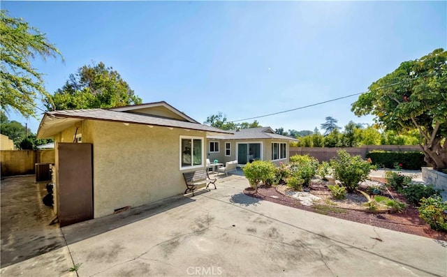 405 W Virginia Ave, Glendora, CA 91741 - back of house with a patio area, a fenced backyard, and stucco siding