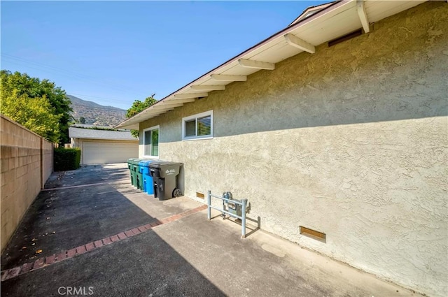 405 W Virginia Ave, Glendora, CA 91741 - view of patio with a mountain view, a detached garage, and an outbuilding