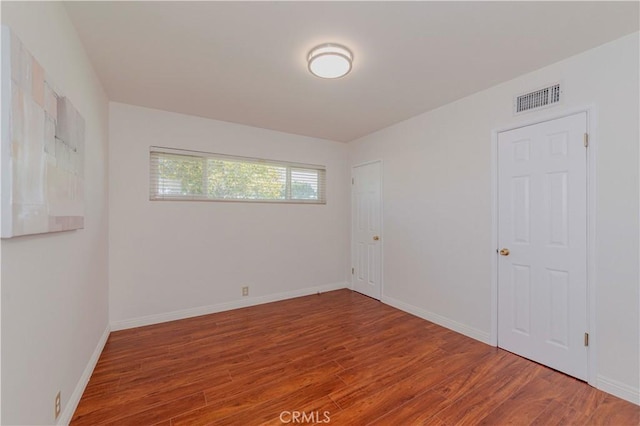 405 W Virginia Ave, Glendora, CA 91741 - empty room with wood finished floors and baseboards