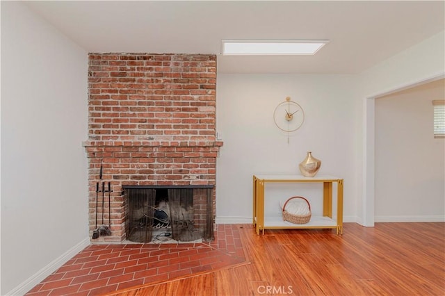 405 W Virginia Ave, Glendora, CA 91741 - living room with wood finished floors and a brick fireplace