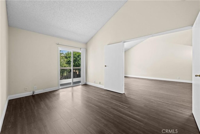 6741 Caro St, Paramount, CA 90723 - empty room with vaulted ceiling, wood finished floors, and a textured ceiling