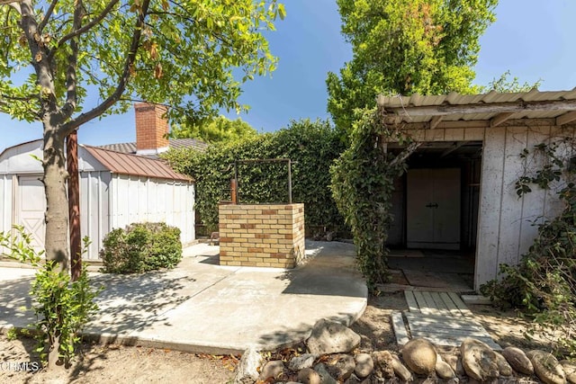 6000 Eugene Pl, Bakersfield, CA 93308 - view of patio / terrace with a storage shed