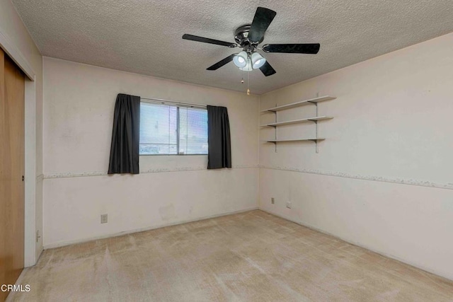 6000 Eugene Pl, Bakersfield, CA 93308 - empty room featuring a textured ceiling, light carpet, and ceiling fan
