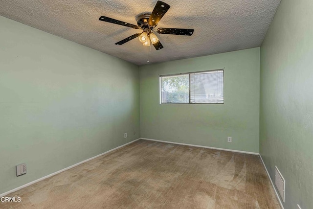 6000 Eugene Pl, Bakersfield, CA 93308 - carpeted empty room featuring a textured ceiling and ceiling fan