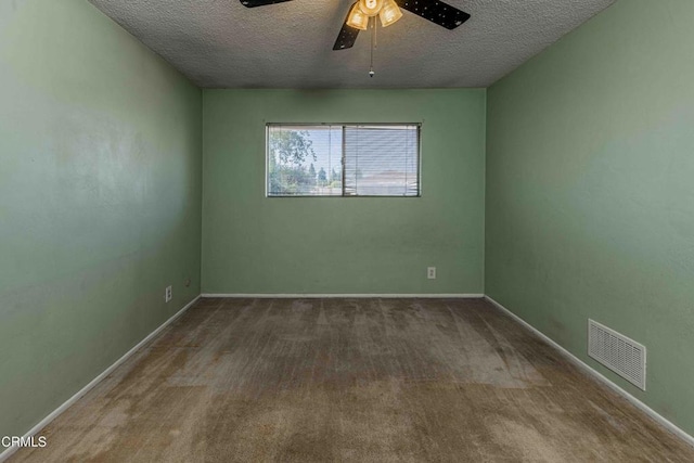 6000 Eugene Pl, Bakersfield, CA 93308 - spare room with a textured ceiling, ceiling fan, and carpet flooring