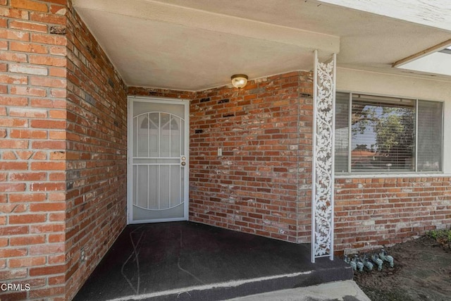 6000 Eugene Pl, Bakersfield, CA 93308 - doorway to property featuring brick siding